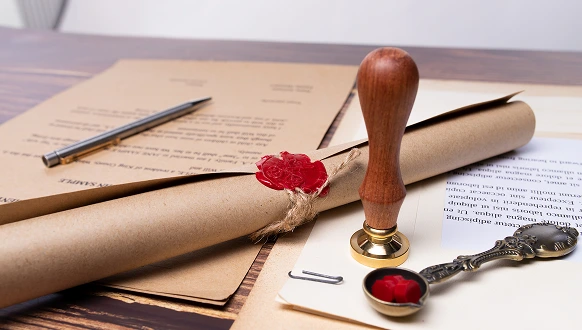 Legal documents and seal representing inheritance planning and asset protection services in the UAE
